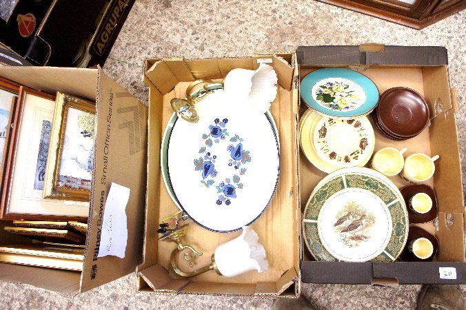 A collection of pottery and pictures to include large: A collection of pottery and pictures to include large Royal Doulton and Wedgwood serving plates, Sylvac Gordon Brown part tea set, Royal Doulton plates and a quantity of framed prints (3 trays)
