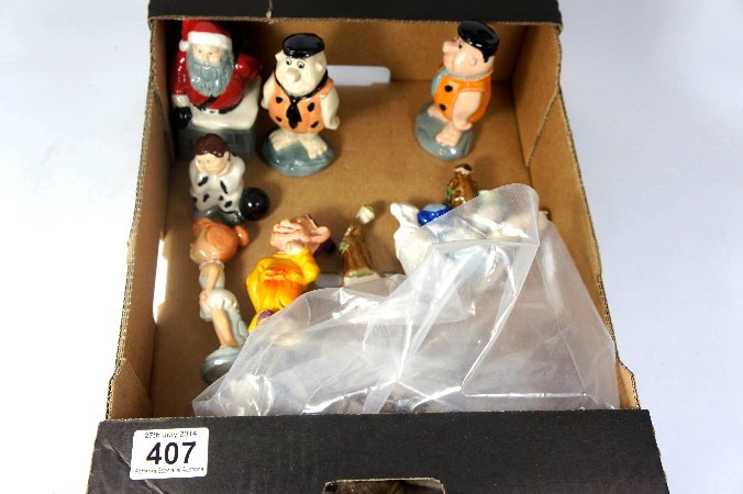 A collection of Wade pottery including various: A collection of Wade pottery including various whimsies, figures etc