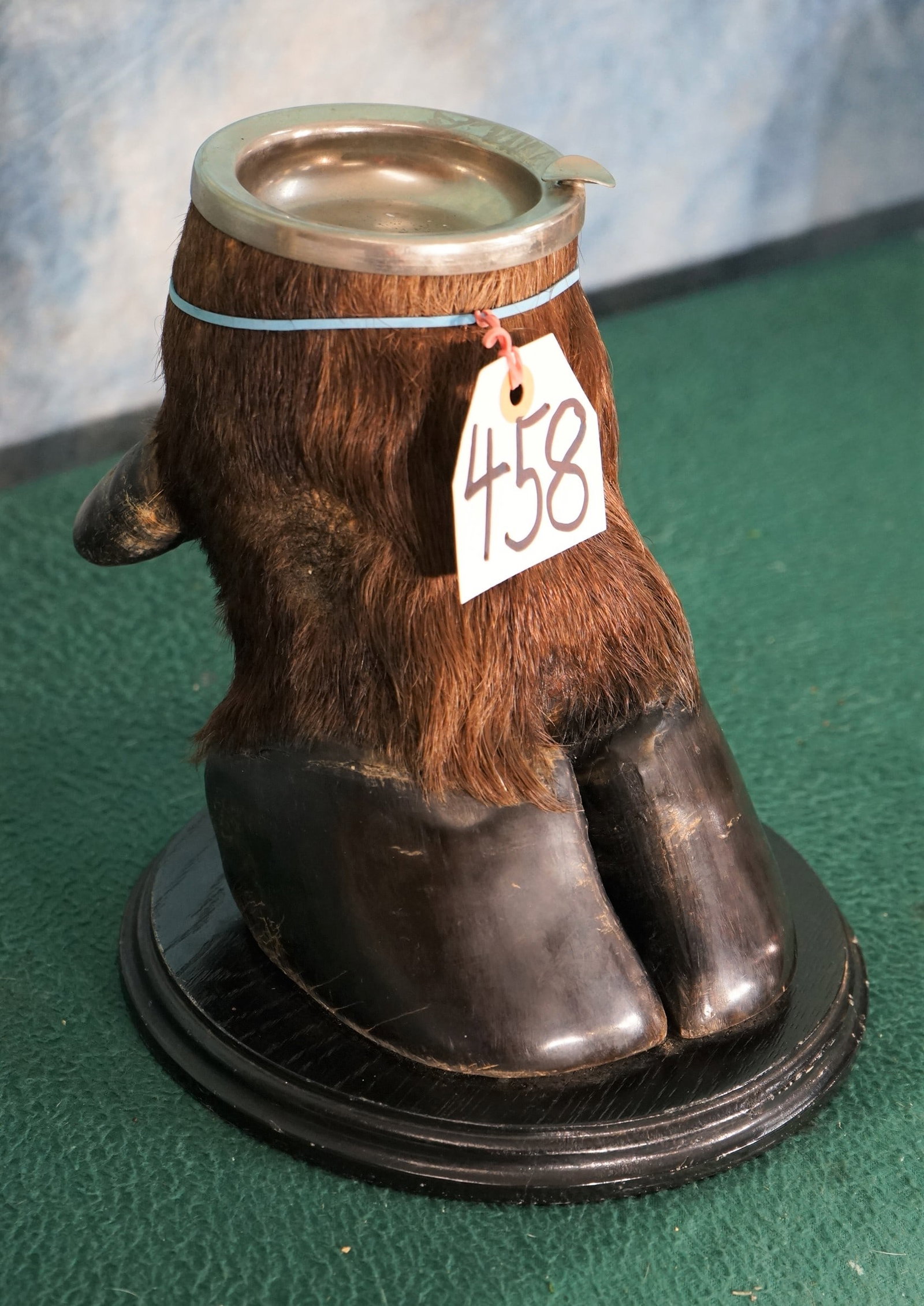 African Cape Buffalo Foot Ashtray Taxidermy: This type of novelty item looks kind a cool in a trophy room, bar, cabin, hunting lodge, or even in a man cave.ÿ Its neat to look at even if you don't smoke.