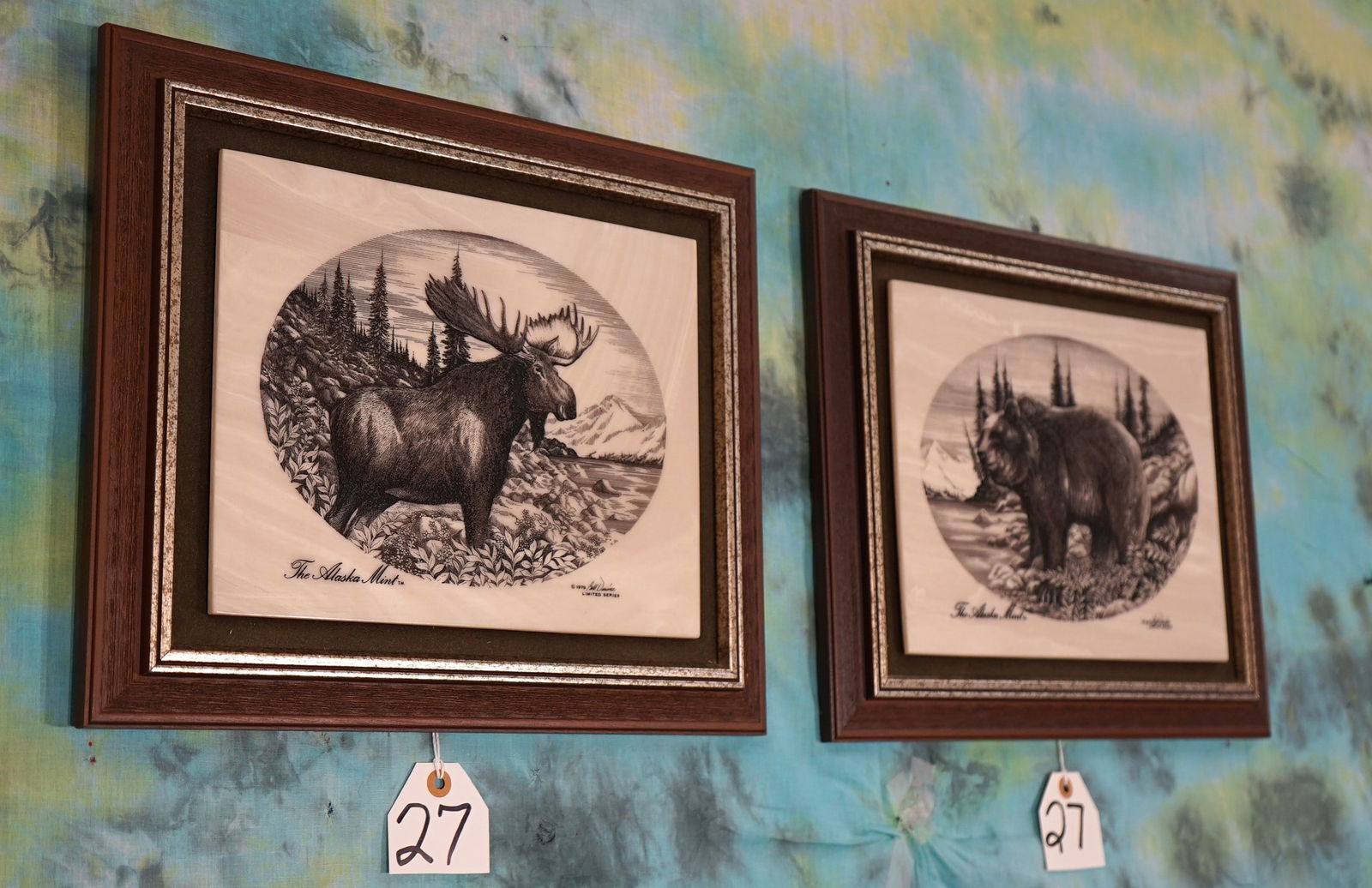 Two Nicely Framed "Etched in Crystalline Marble" Wildlife Pictures: Both of these are were designed by Bill Devine and measure 16 3/4" x 13 1/2". One is a beautiful Interior Grizzly Bear and the other is a big Alaskan Yukon Bull Moose. The Alaskan Mint produced a limi