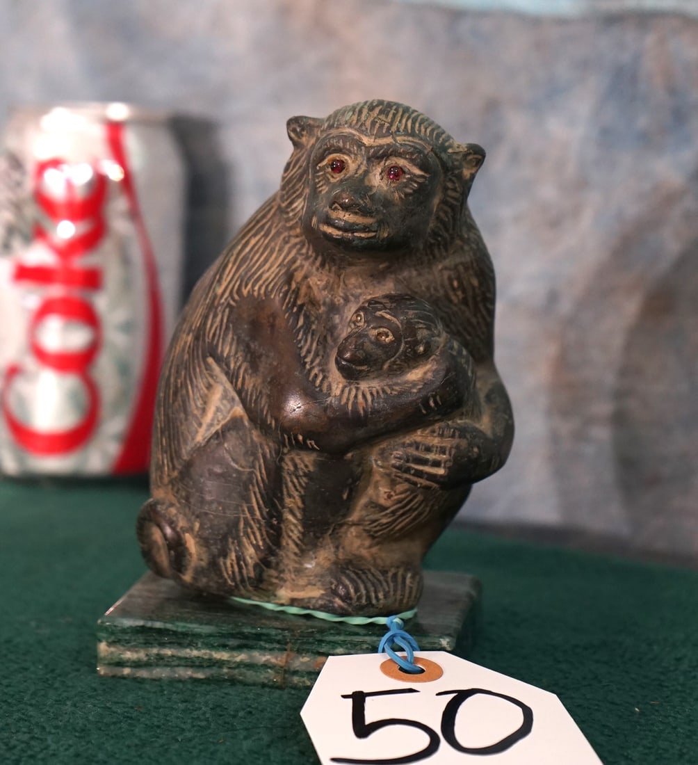 Olive Green Soapstone Carved Monkey with Baby: Both of these Monkeys have Gemstone eyes. We are not sure what type. This is a neat decoration from 1960's circa, East Africa.