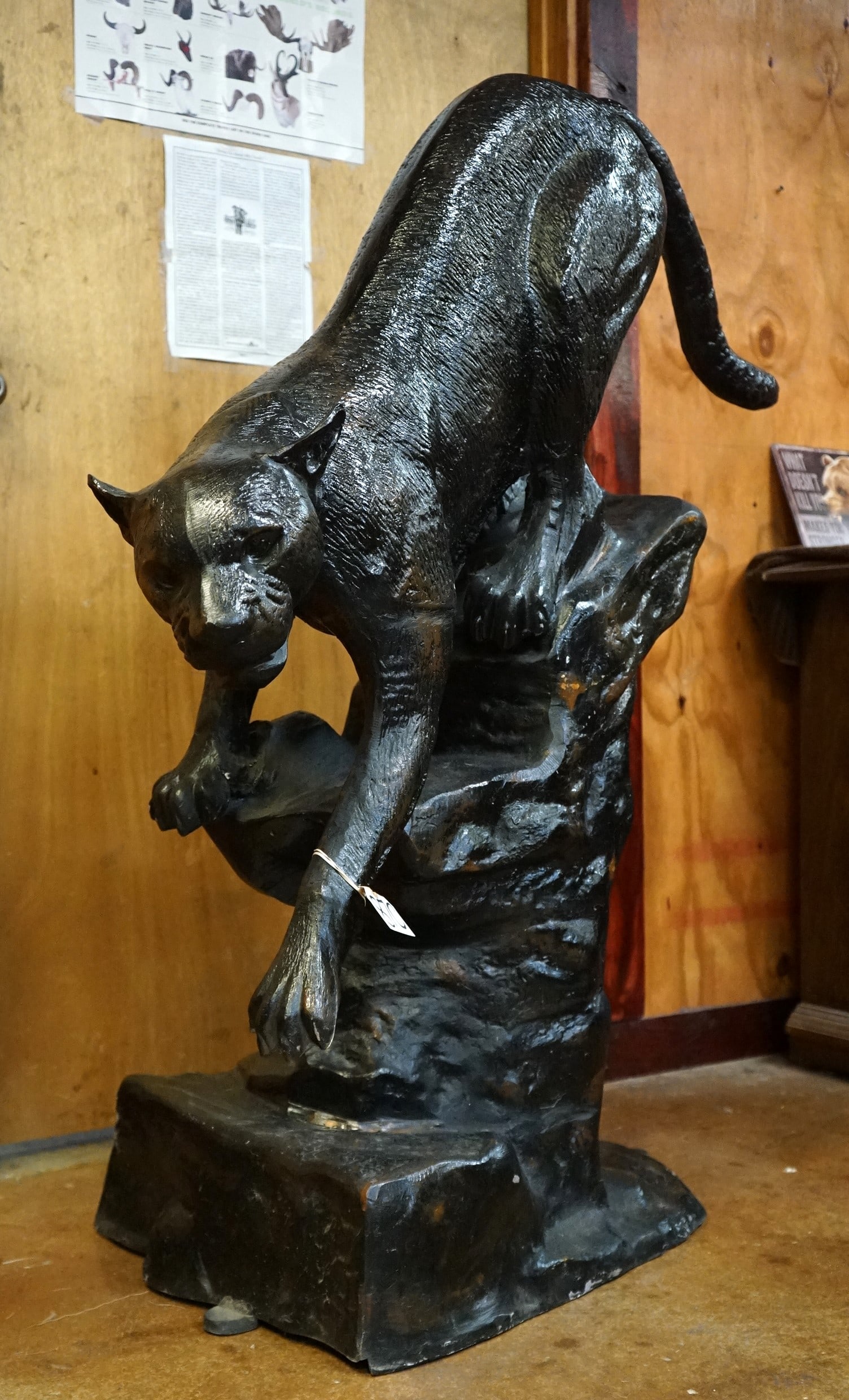 Black Metal Mountain Lion Yard Statue: This statue is clean and in mint-like condition as well as the other two of these metal statues. This one is black with brown undertones. The statue is 4 feet 2" high, and 4 feet long. This Mountain L
