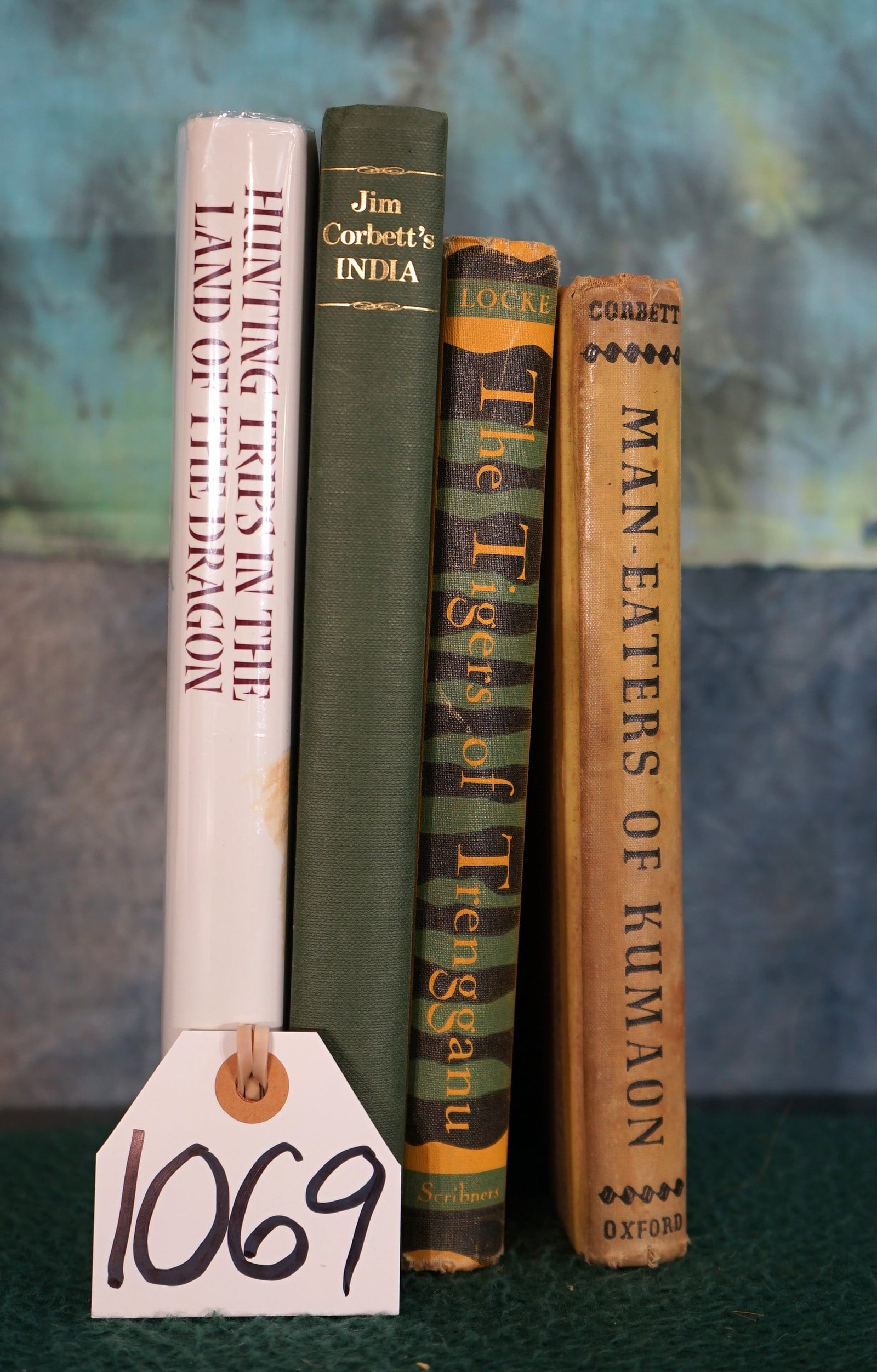 Four Hunting Books About Hunting Tigers, Leopards, and Man-eaters in India: Three pf these Books are from the famous Jim Corbett. The other is about Tiger hunting in China years ago.