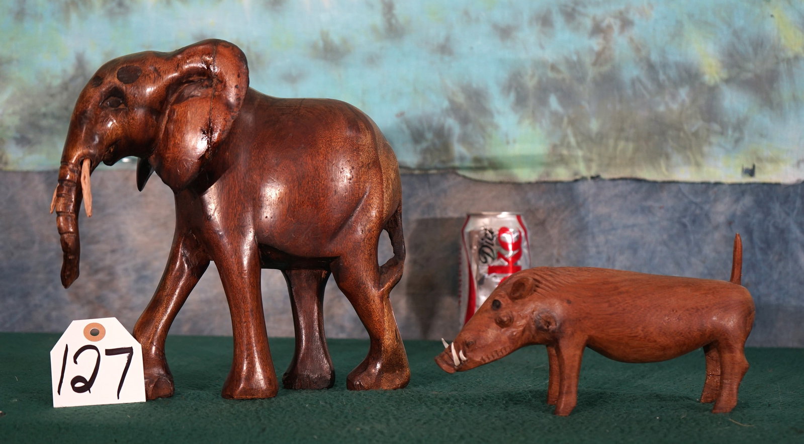 African Wood Carved Elephant & Warthog Decor: The Elephant had cracks in both ears but these have been very nicely repaired. Both of these carvings will make a great decor for the bookshelf of fireplace ledge.