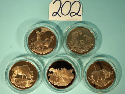 East African Wildlife Society set of Five 3 0z. Solid Bronze Animal Coins: Here we have 3 0z. solid Bronze Coins of Cape Buffalo, Cheetahs, Hippos, Gerenuk Gazelles, and Eland. These Coins are in mint condition and portray great animals of East Africa. We do not know the exa