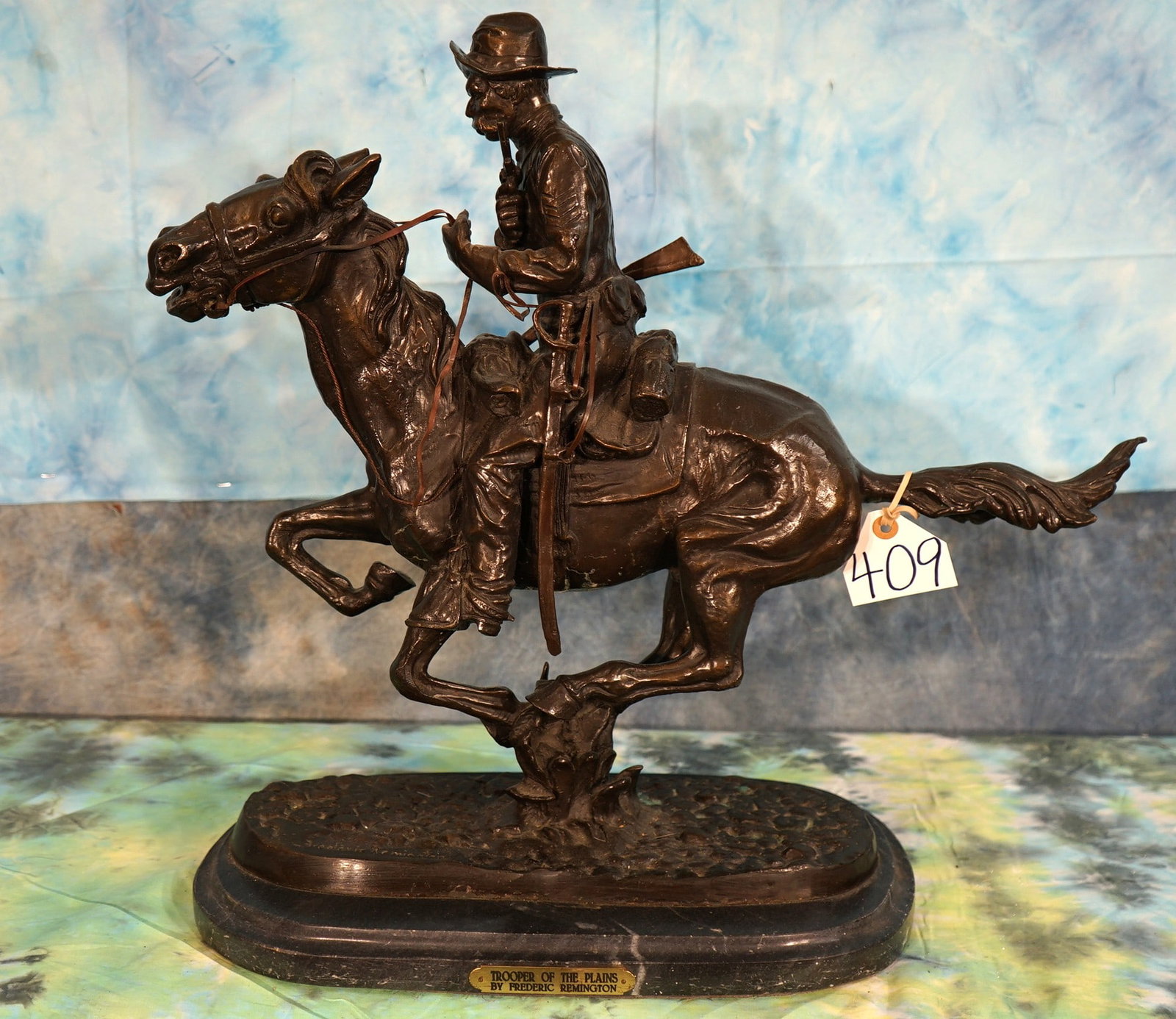 Western Bronze "Trooper of the Plains" by Frederick Remington: This is a beautiful Western Bronze by the famous Frederick Remington. This one is quite popular. It measures 22" tall, 23" long, and 10 1/2" wide. The detail of this Bronze is amazing.