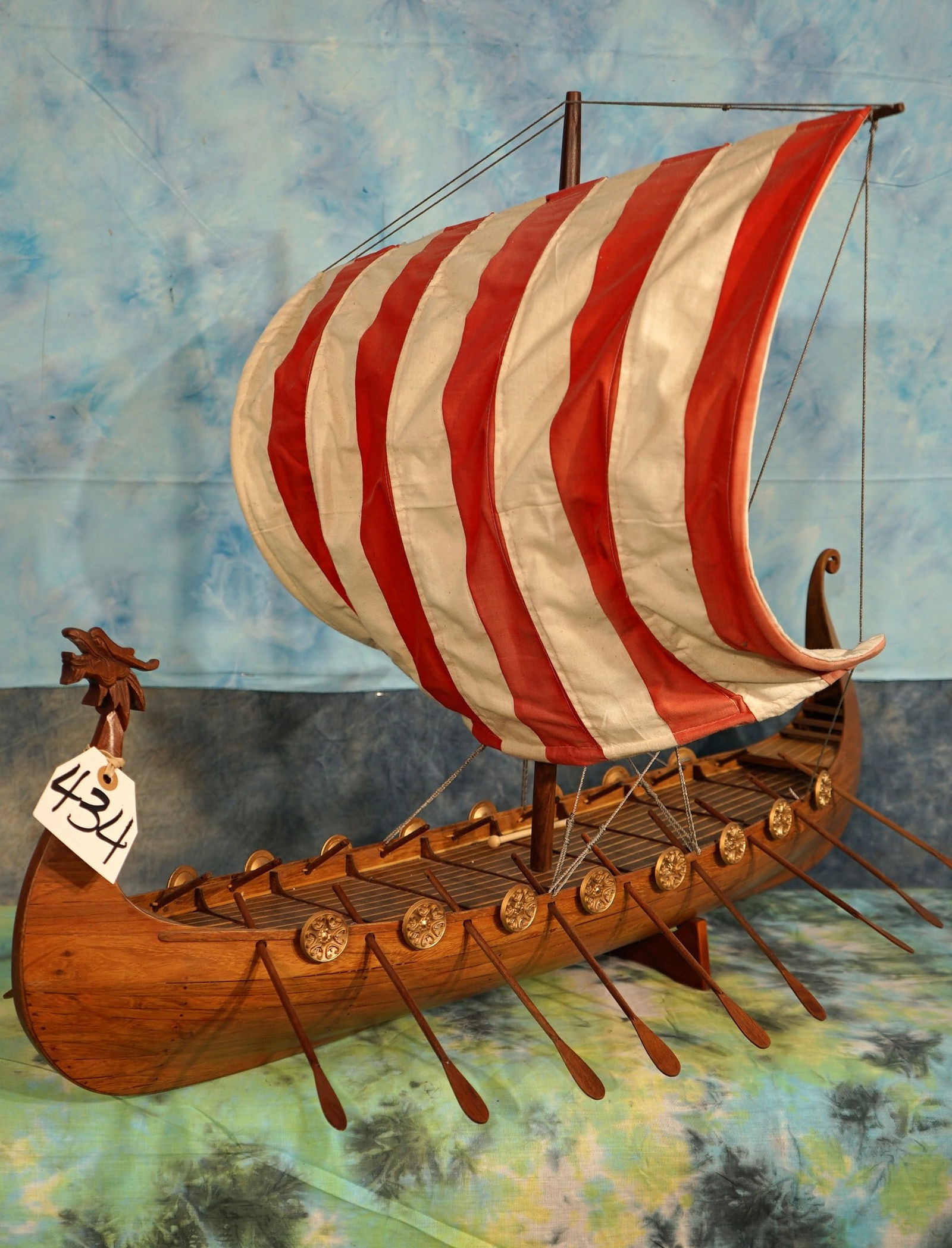 Cool Antique Wooden Model of Viking Ship: This old model Viking Ship is really cool to look at and it will make a fine decor. The Ship is in very good condition and clean. It measures 24 1/2" tall, 31" long, and is 16" wide. The Ship has a go