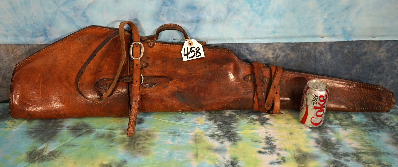 Good Leather Gun Carrying Case for Pack Saddle Horse Hunt: This Gun case is very adjustable and will hold small lever action rifles, and up to 30" Barrel Mauser types with scope. It has the tie downs already for the Saddle. If you want to hunt Sheep, Mountain