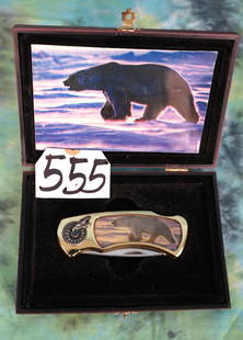 Very Cool Polar Bear Pocket Knife with Custom Display Case: This Knife is new and in mint condition. It is gold trimmed with a pretty blue Gemstone on one side, and comes with a very nice display case.