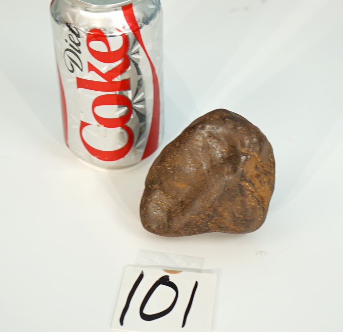 Authentic 2 Lbs. Meteorite From China: This is a real Meteorite that was found in China, from the Meteor V242. Its weighs 686 grams, and mainly consist of iron. This is really a fantastic collectors item, as well as a super conversation pi