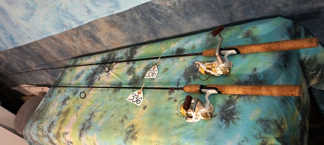 Two Spin Cast  Rods and Fishing Reels
