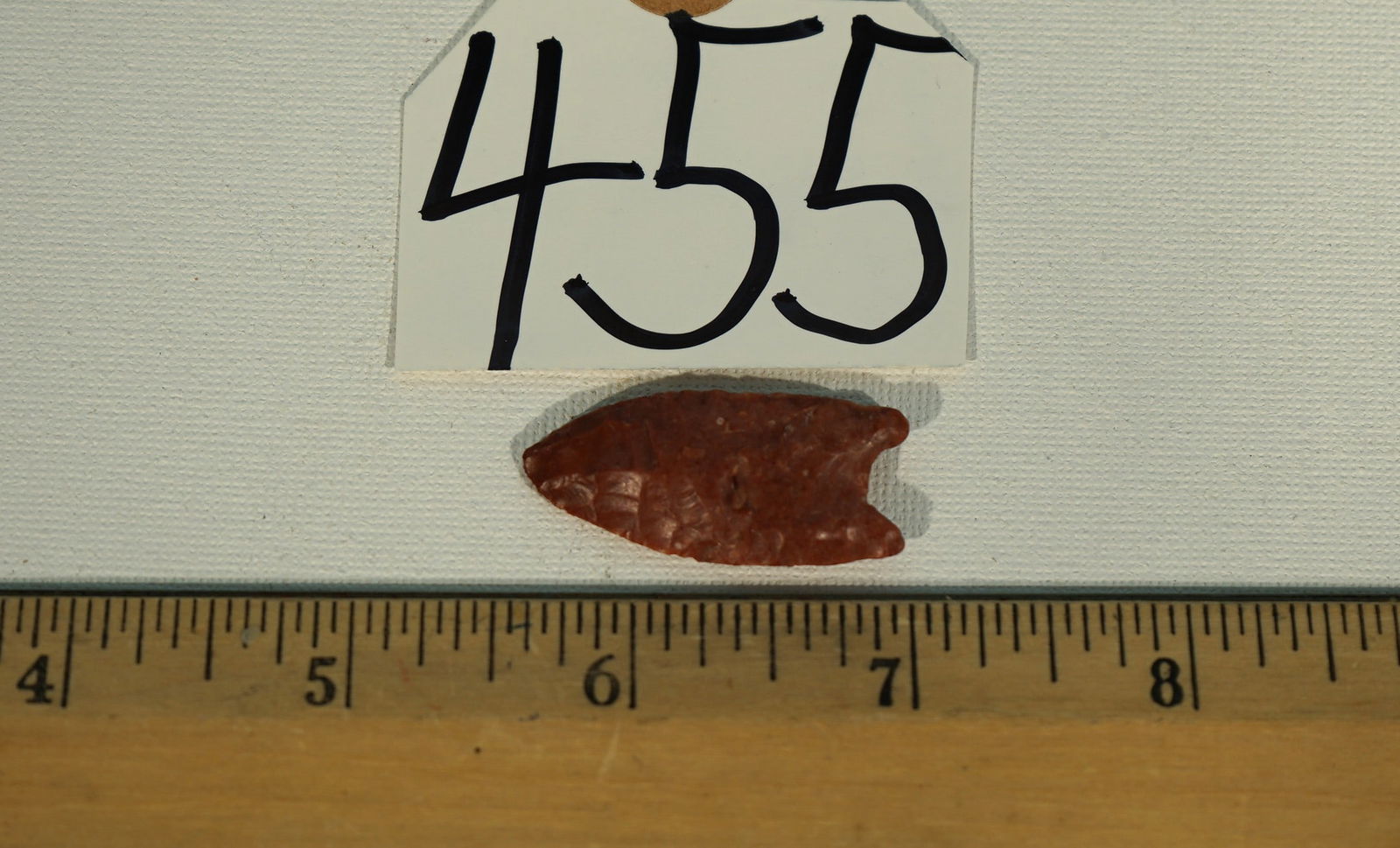 Rare! Authentic Red Jasper Paleo Folsom Point Double Fluted Arrowhead Artifact: This beautiful Folsom Point was recovered from El Paso County, Texas. It was made from brown reddish colored Jasper during the Paleo Period. The Point measures 1 7/16" long, and it is 10/16" wide. Thi
