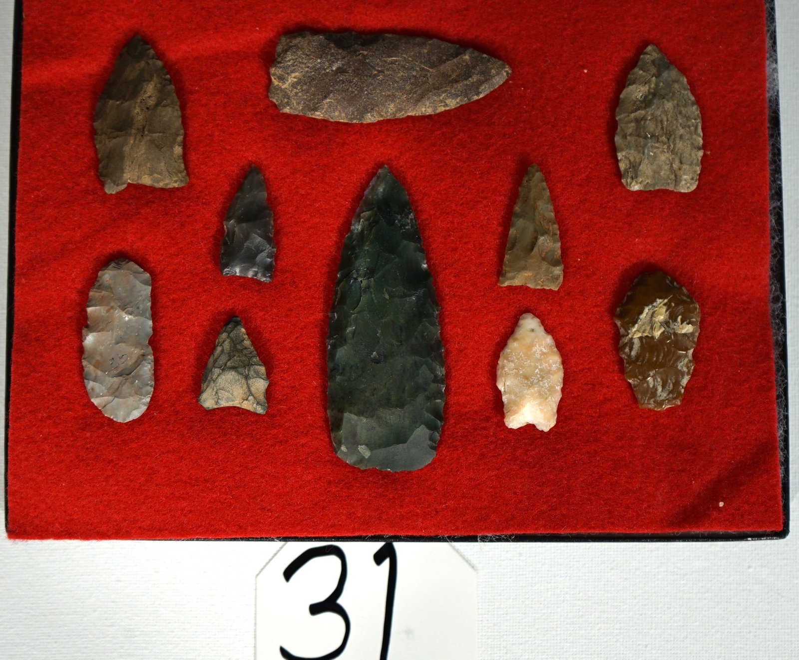(10) Authentic Paleo Spear Points & Knife Artifacts Arrowheads in Display Case: In the top right corner is a decent Clovis Point. Also, their is some good Paleo Knives in here. All of these Points are authentic and in excellent condition.