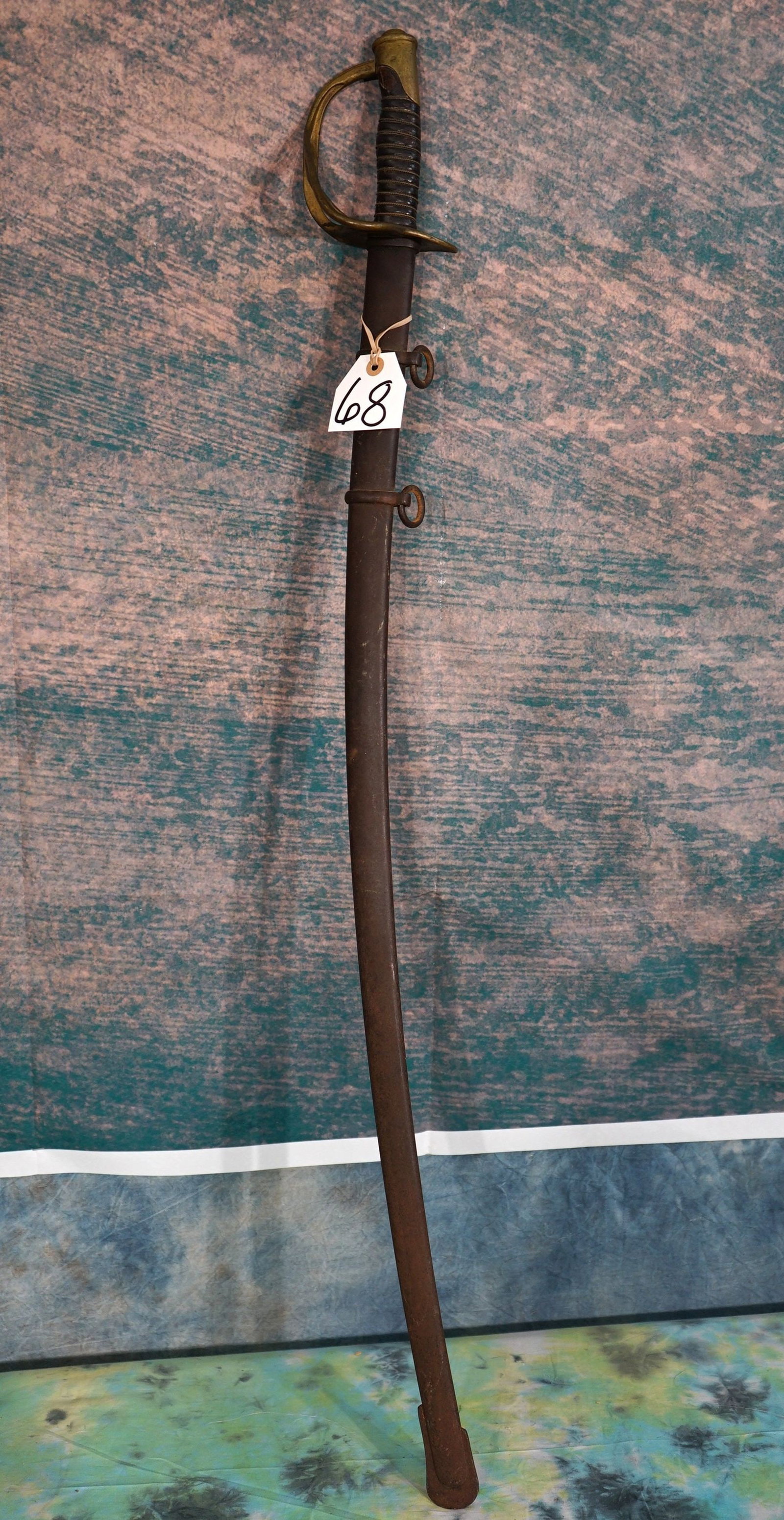 Authentic Ames Army Union 1864 Civil War Sword and Scabbard: This Sword is authentic as well as the Scabbard. The condition is very good and it would grade an 8.5 on a 1 to 10 quality scale.