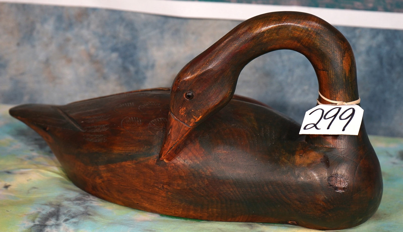 Hand Carved Wooden Goose Decor: This wood carved Goose is in excellent condition. The carver placed good detail in the Goose, and made this is a really fine piece of art.