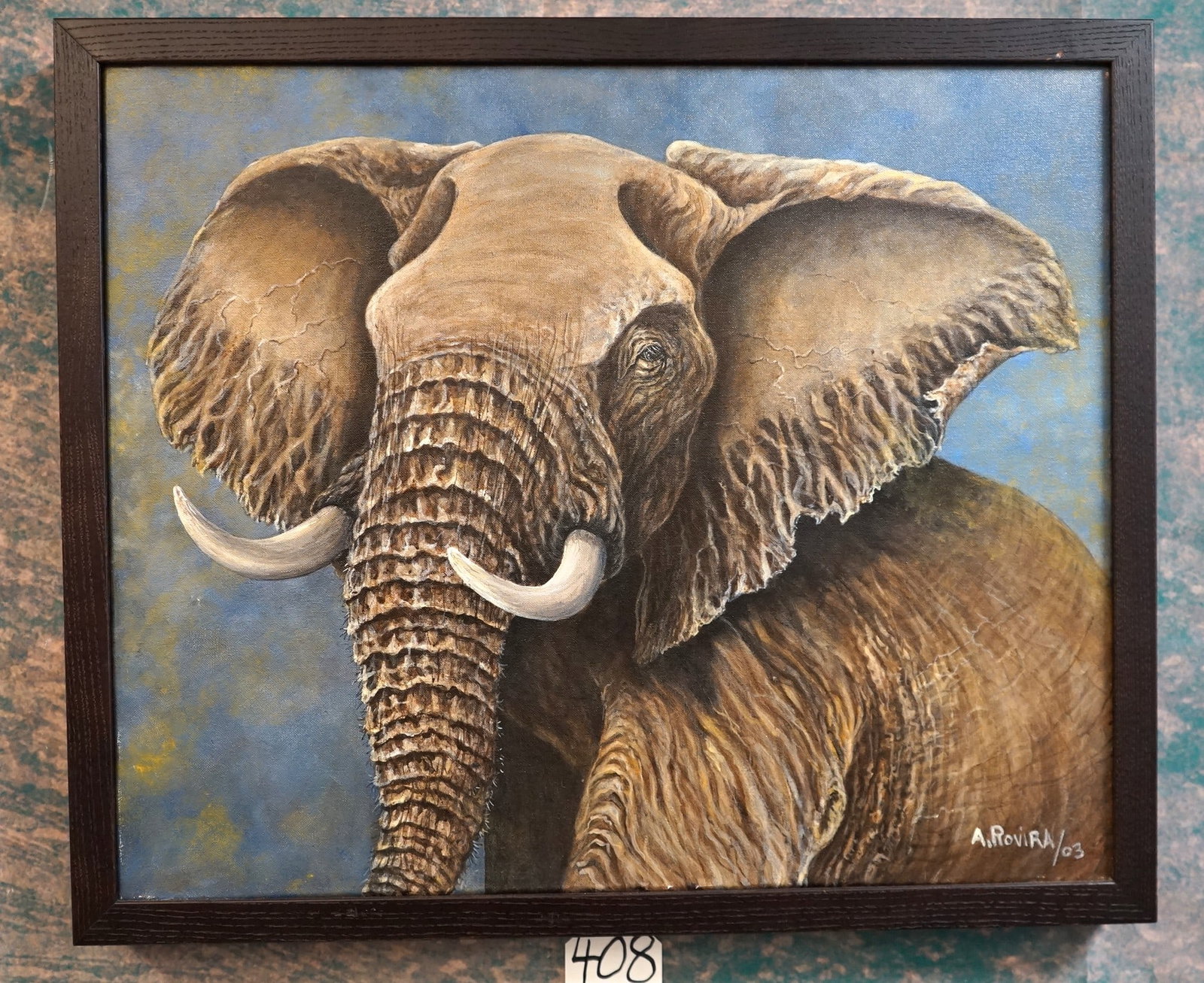 Beautiful Framed Painting of African Elephant by A. Rivira: This Painting is in mint-like condition. The frame is 21 1/4" x 25 1/4". The Painting has bright and natural colors, and excellent detail. The painting was done in 2003, and is a fine piece of art.