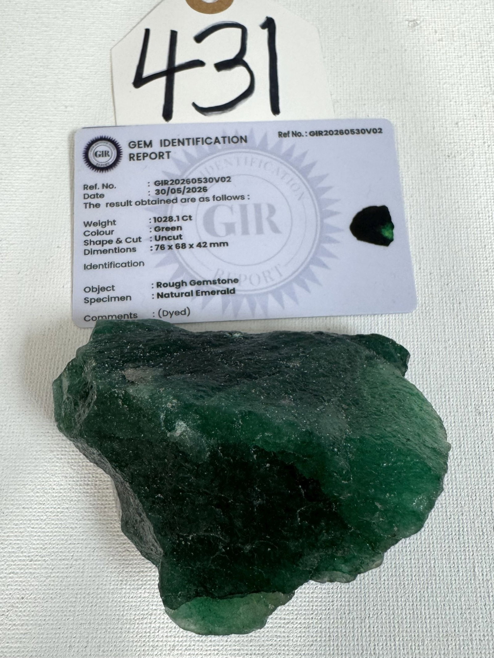 Authentic Rough Cut 1,028.1Cts. Natural Emerald Gemstone with Identification Report Card: This large chunk of Emerald Gemstone is what they look like when they come out of the mines. This one is from Columbia, and it can make a lot of necklaces, pendants, and beautiful rings.