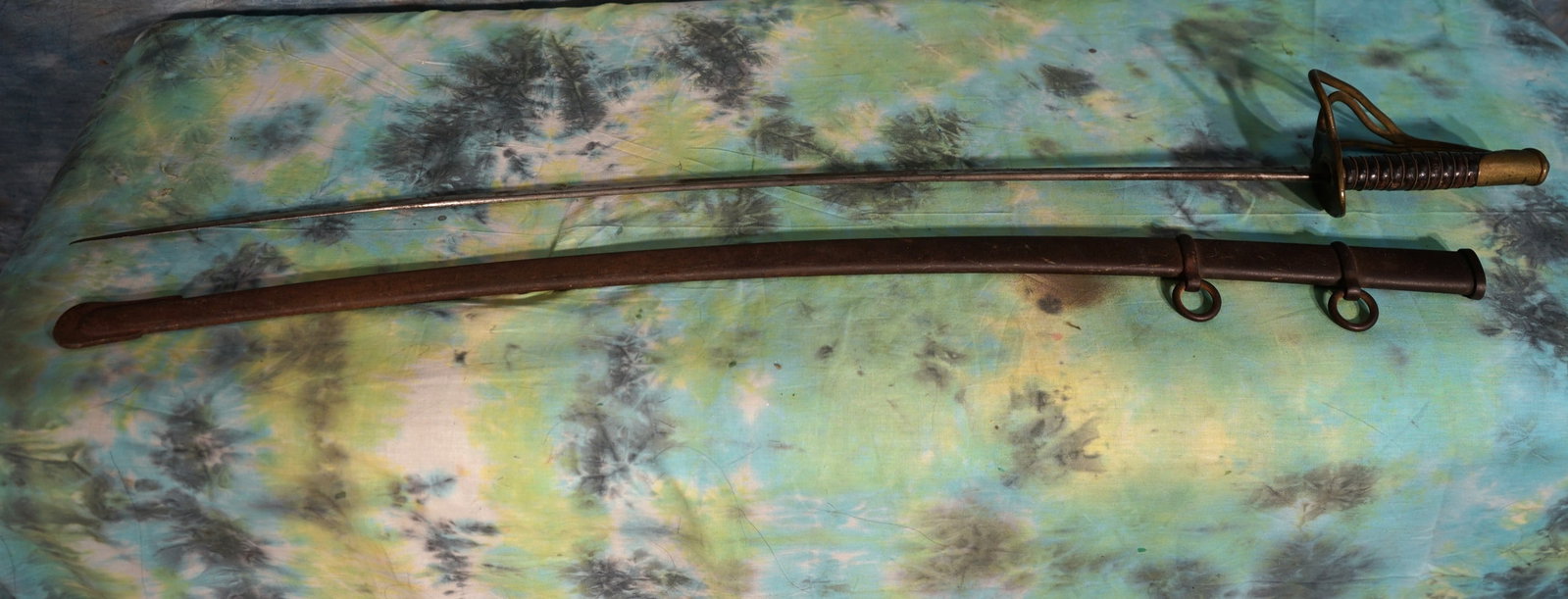 Authentic 1864 Union Army Civil War Sword with Scabbard: This Sword is in excellent condition, especially for its age. This one was made at the Ames Armory. The Scabbard is the proper match for the Sword, and it also in excellent condition. The Civil War wa