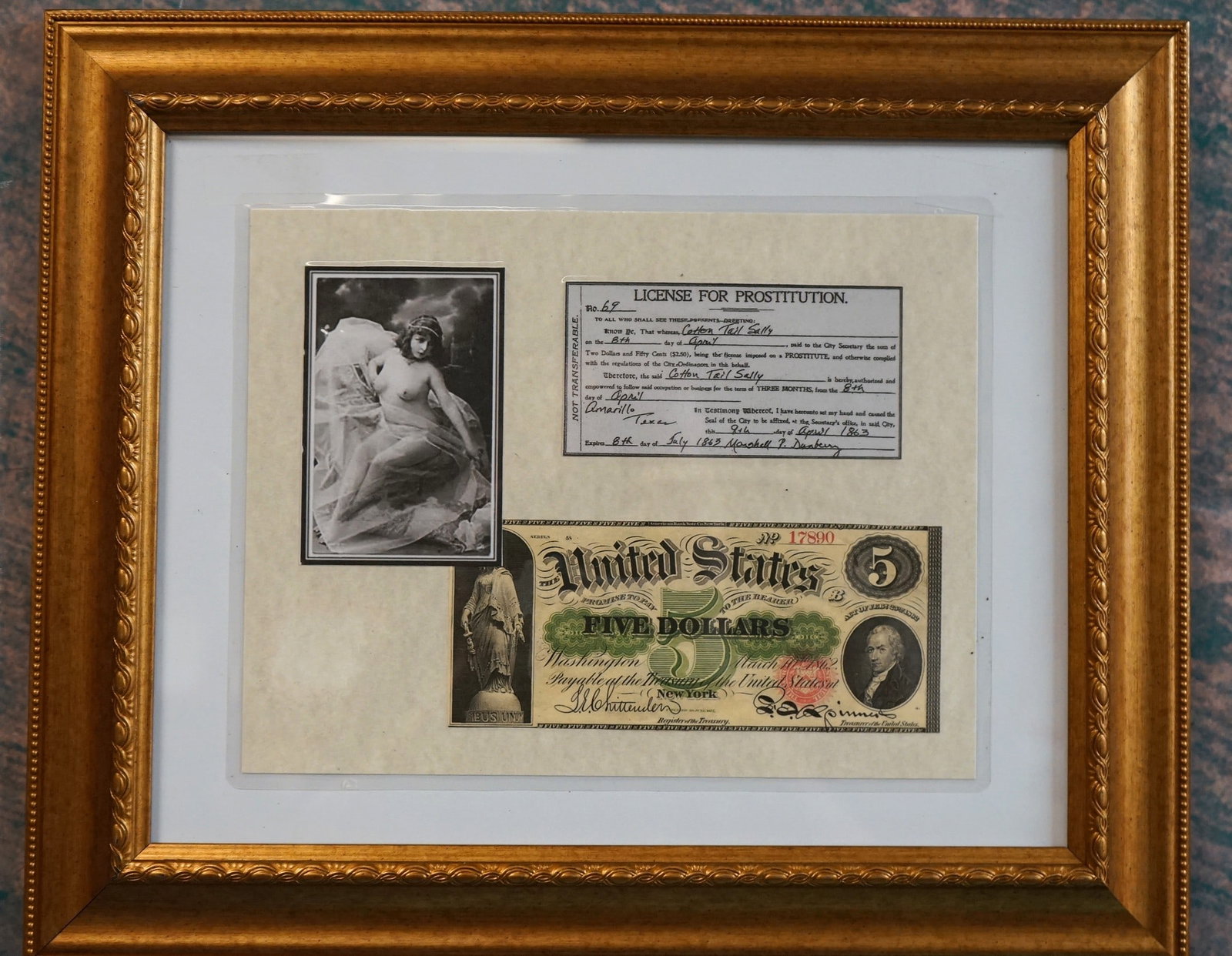 Old West Framed Copy of a Authentic Prostitution License: This is an exact high quality copy of an original old West Prostitution License. This one is for Cotton Tail Sally. It is signed and detail by Marshal P. Dunberry on the 8th of July, 1863. The License