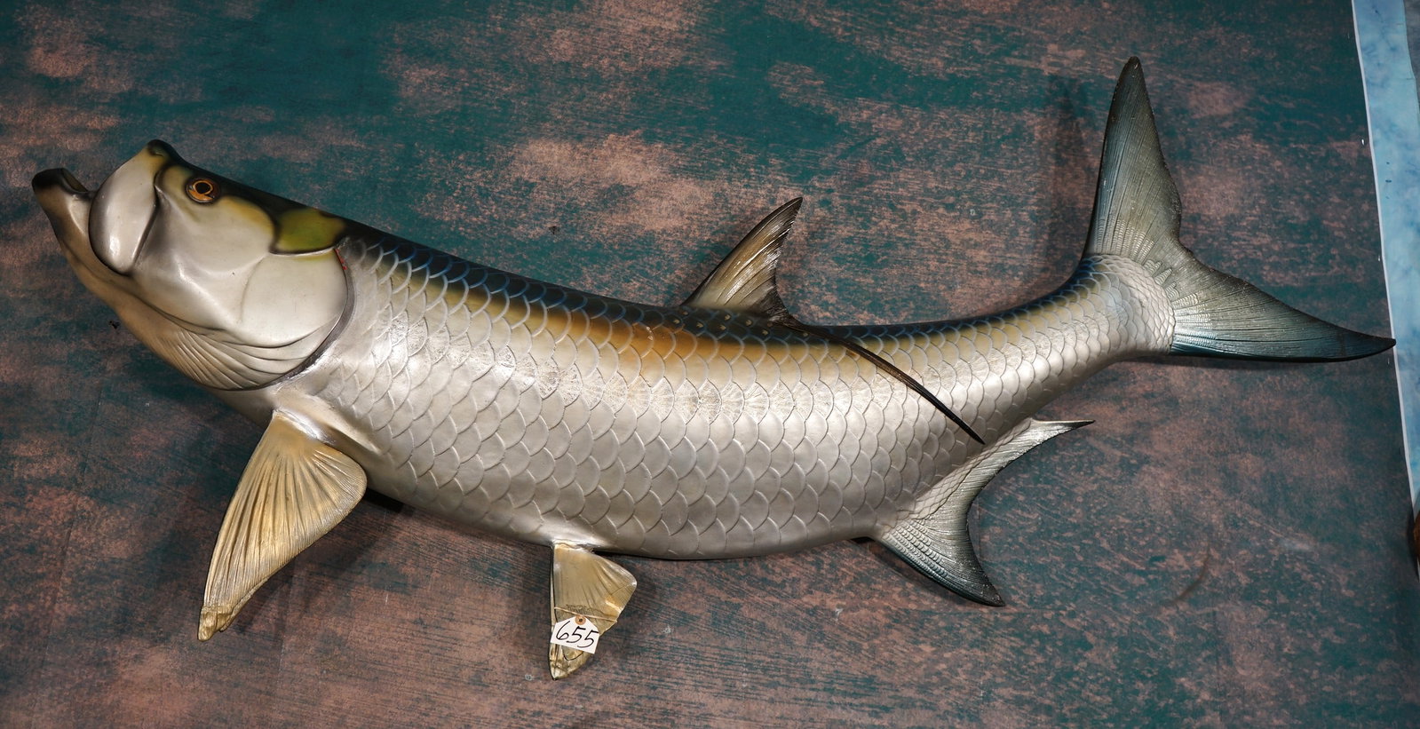 6ft. 2" Fiberglass Reproduction Tarpon Taxidermy Fish Mount: This mount is very lifelike, clean, and in excellent condition. The detail is excellent and the mount is fairly lightweight. The taxidermy quality is excellent, and this mount grades a very high 9.85.
