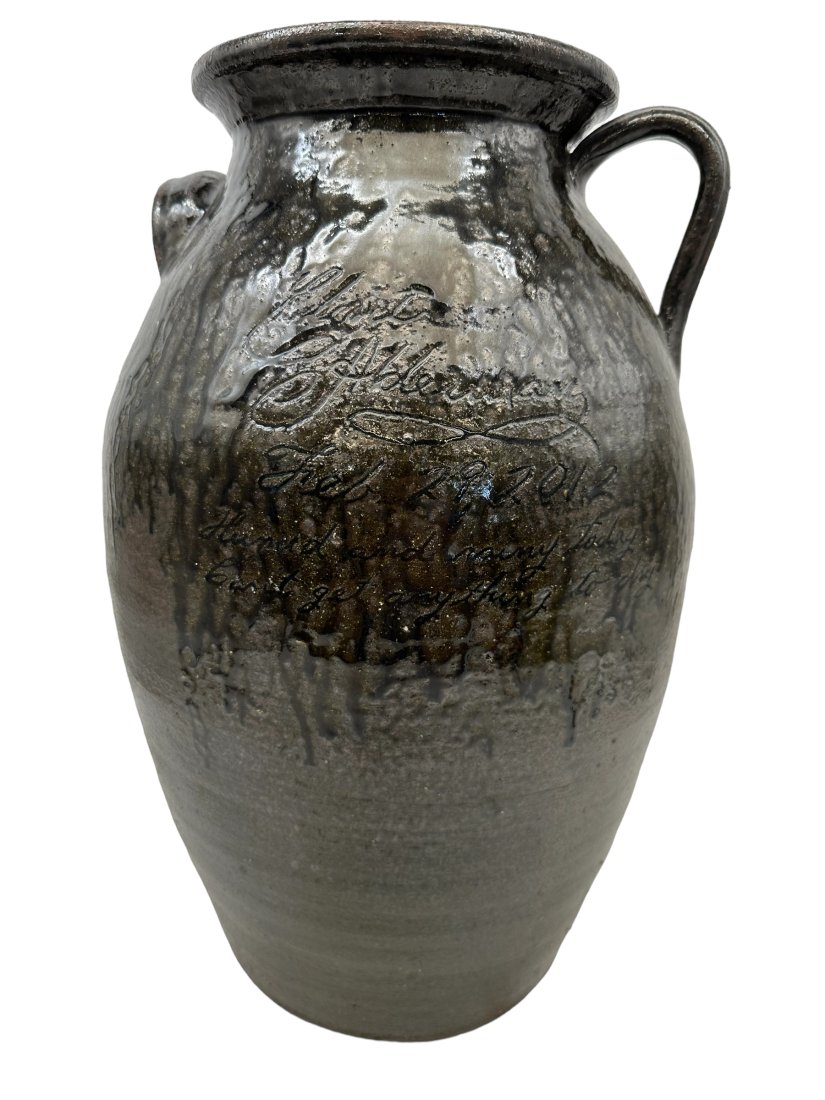 Clint Alderman 4 Gallon Leap Year Churn: Mint condition. Signed and dated on front. 16.5 inches tall. Inscribed "Feb 29 2012 Humid and rainy today cant get anything to dry".
