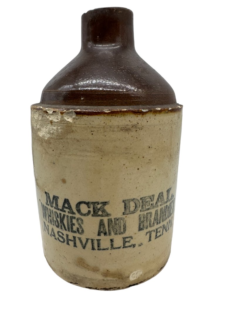 Mack Deal Whiskies & Brandies Nashville Tenn Stoneware Jug: Chips throughout jug on sides and bottom. See photos. Measures 9 inches tall.Selling as-is.
