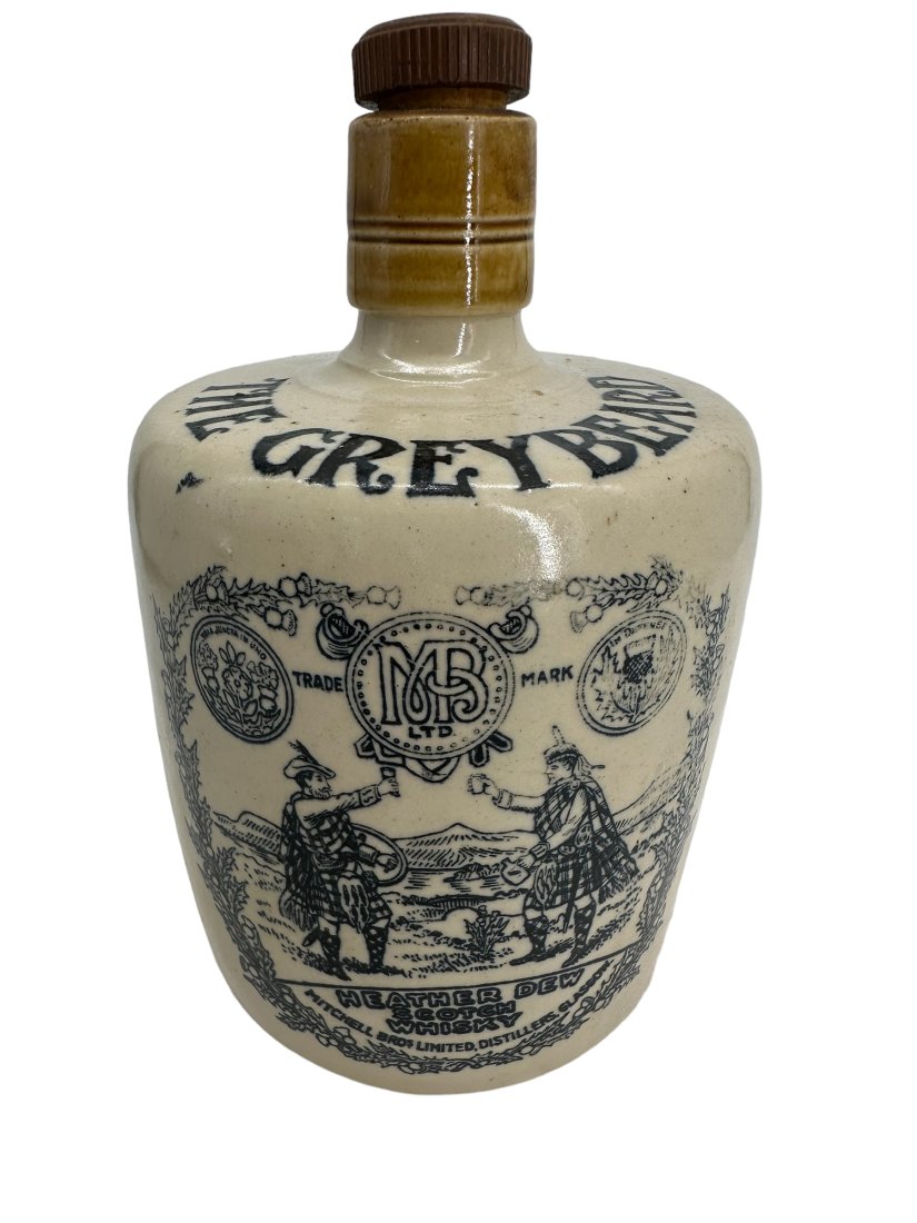 The Greybeard Heather Dew Scotch Whiskey Stoneware: Good condition. 7 inches tall.