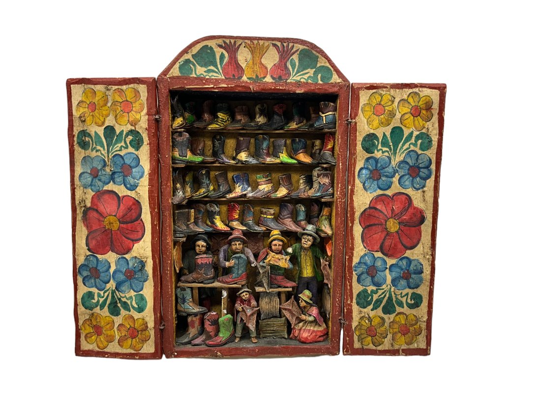 Eleudora Jimenez Family Folk Art Diorama Boot Village: Some chips and small losses. Hands of figures, etc.One loose boot. Still very solid and intact. See photos. Closed box measures 13.50 inches tall x 8 inches wide x 3 inches deep.