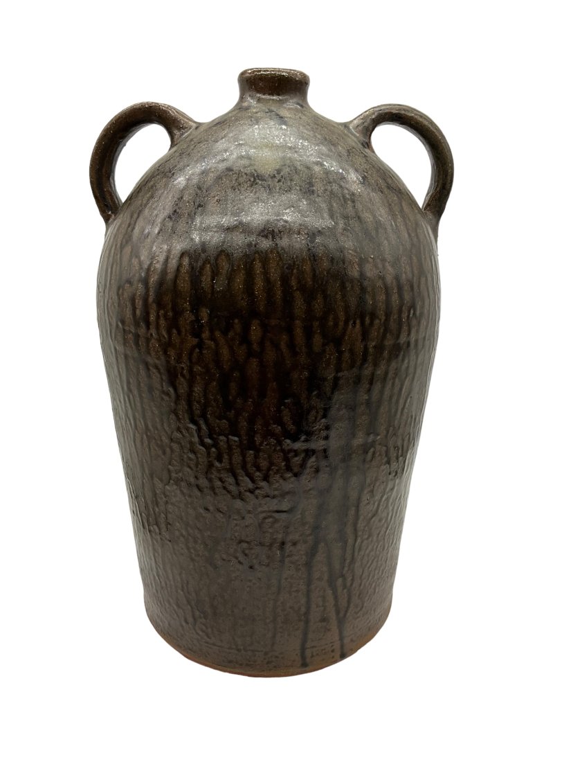 Mike Craven Two Gallon Jug: Item measures 13.75 inches tall. At the bottom of one strap handle is a stamped 2. The other handle has the CFP Shield at the bottom. Signed and dated on bottom. Item in mint condition.