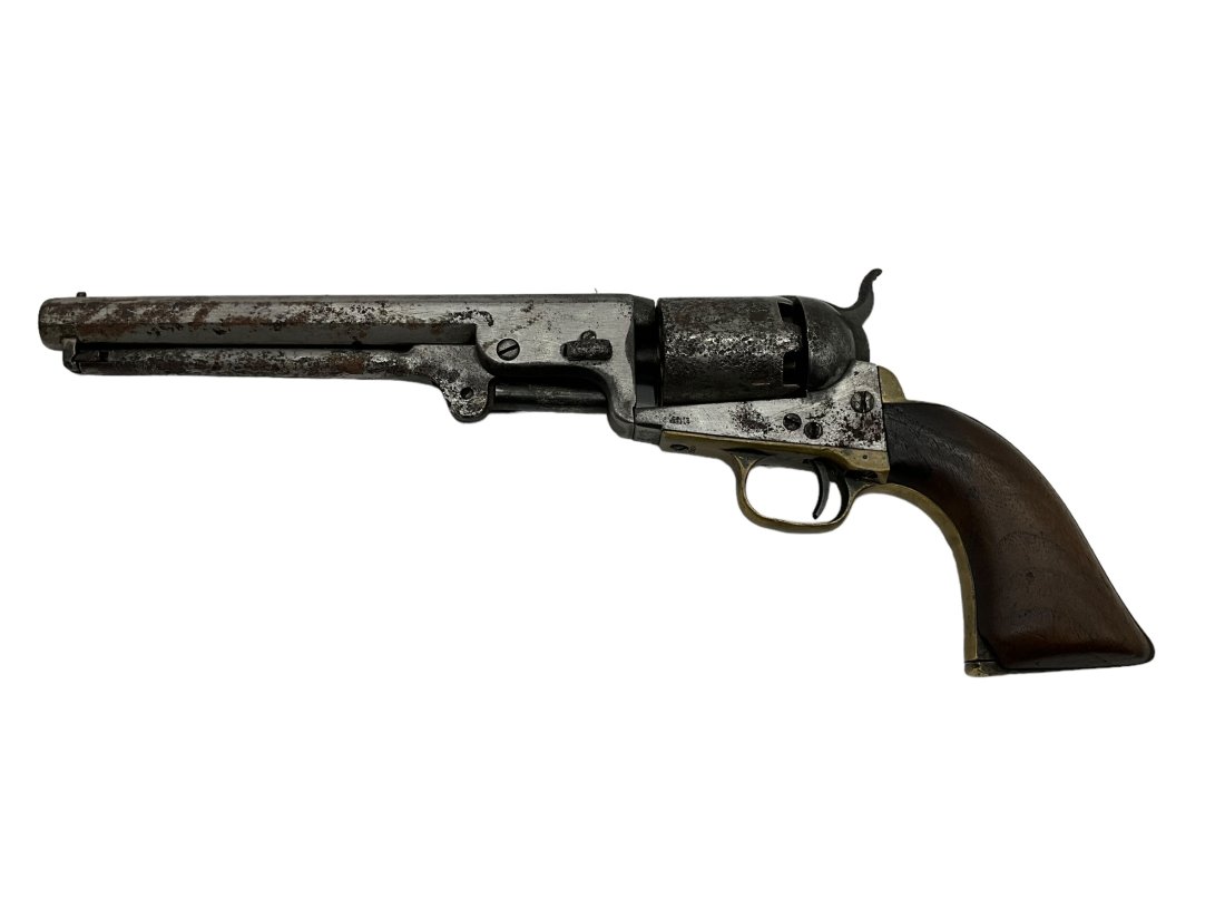 Colt Model 1851 Navy 6 Shot Revolver Serial #29854: Serial number shows to be a 36 caliber. All matching serial numbers. Octagonal barrel marked” Address Saml Colt New York”.Looks to be a walnut handle and brass trigger guard. Heavy pitting