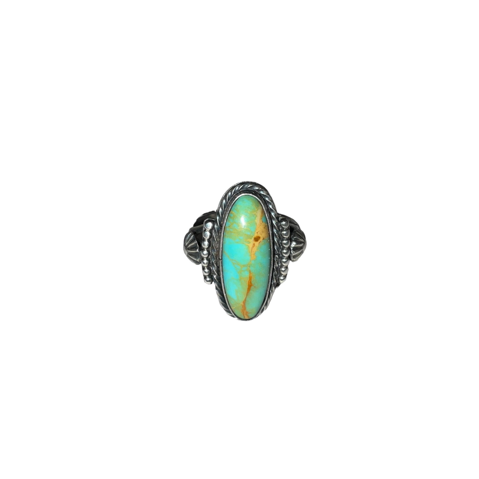 Richard Begay Navajo Long Turquoise Ring: Excellent condition. Marked 'RB Sterling'. Stone measures 1 inch. Size: 8. Total weight: 7.0 grams.