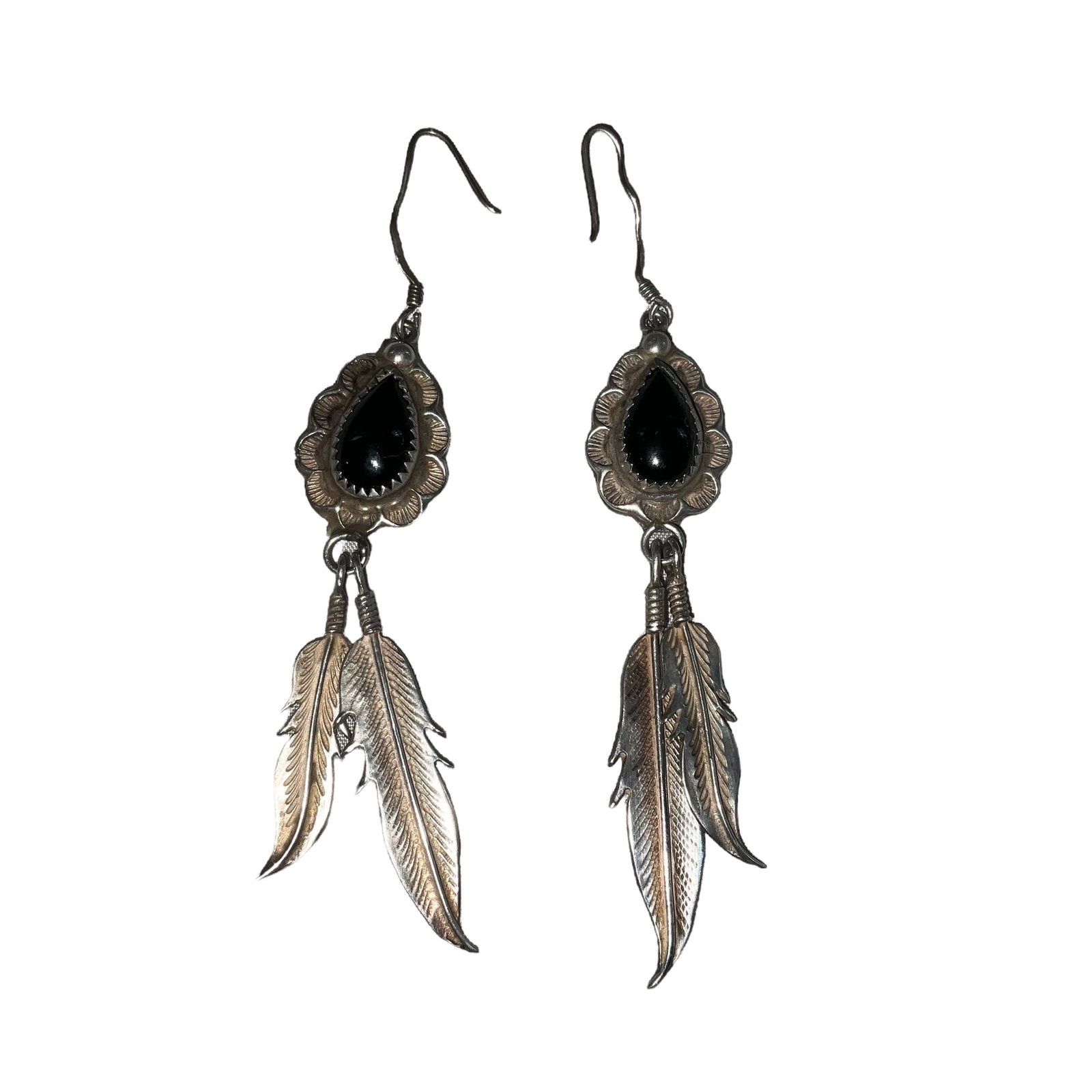 Navajo Ida Morgan Black Onyx Feather Dangle Earrings: Excellent condition. Measures 2.5 inches. Stamped 'Sterling' on back of one and 'Ida M' on the other. Weight: 11.3 grams.