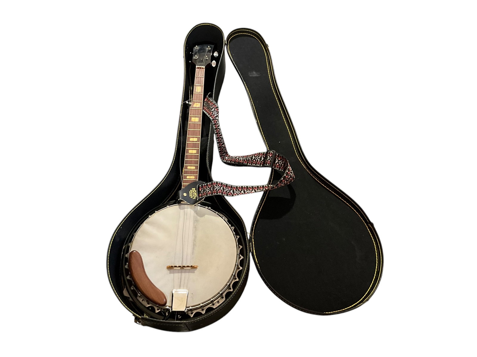 1980's Encore E-75 Banjo with Case: Missing 1 string. Overall great condition.