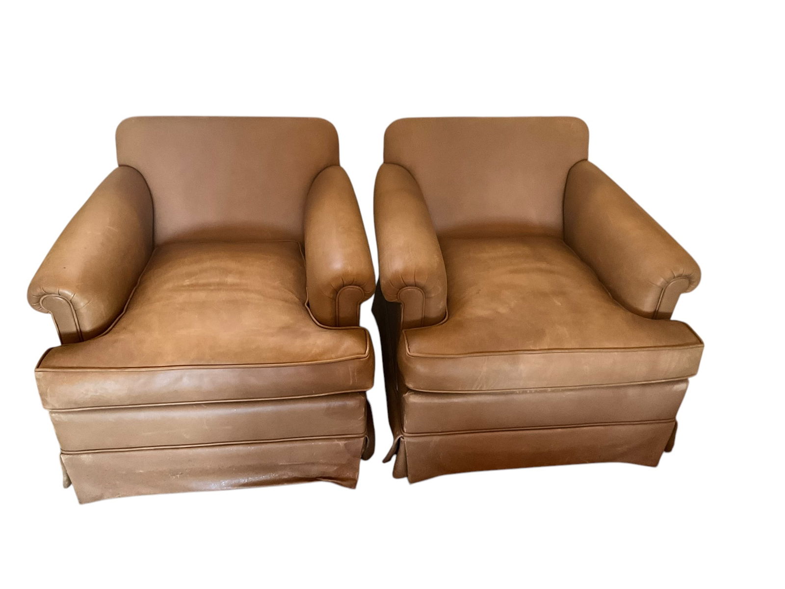 Pair Leather Club Chairs With Pillow Backs: Normal wear but no damage or odors. Great looking patina on real leather. A few light scuffs and scratches. 35 inches deep x 35 inches wide x 29 inches tall. See photos.