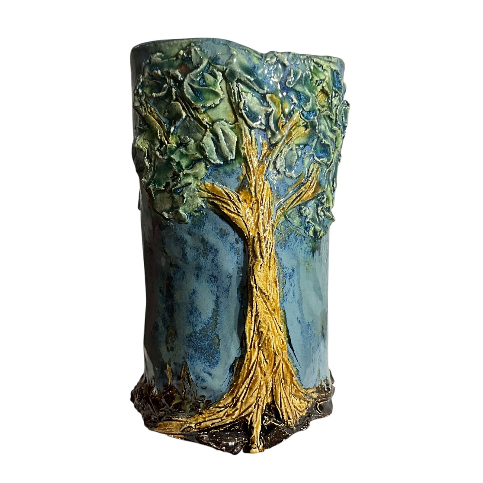 Celina R. Schoen Folk Art Pottery Signed by Artist in 2013: Raised tree design on both sides, even has a small bird flying between the trees. Excellent condition and is approximately 7 1/2 tall and approximately 4” at widest point.