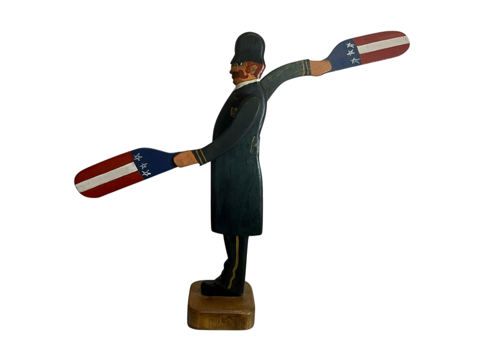 Moveable Arms Whirligig Signed Janice Fenimore 1986 (Smithsonian): American “Policeman Bobby” Whirligig.This piece is 15” tall and 19” at the widest point.Looks like tip of shoe has repair. Very minor. Her work is displayed in the National Folk Ar