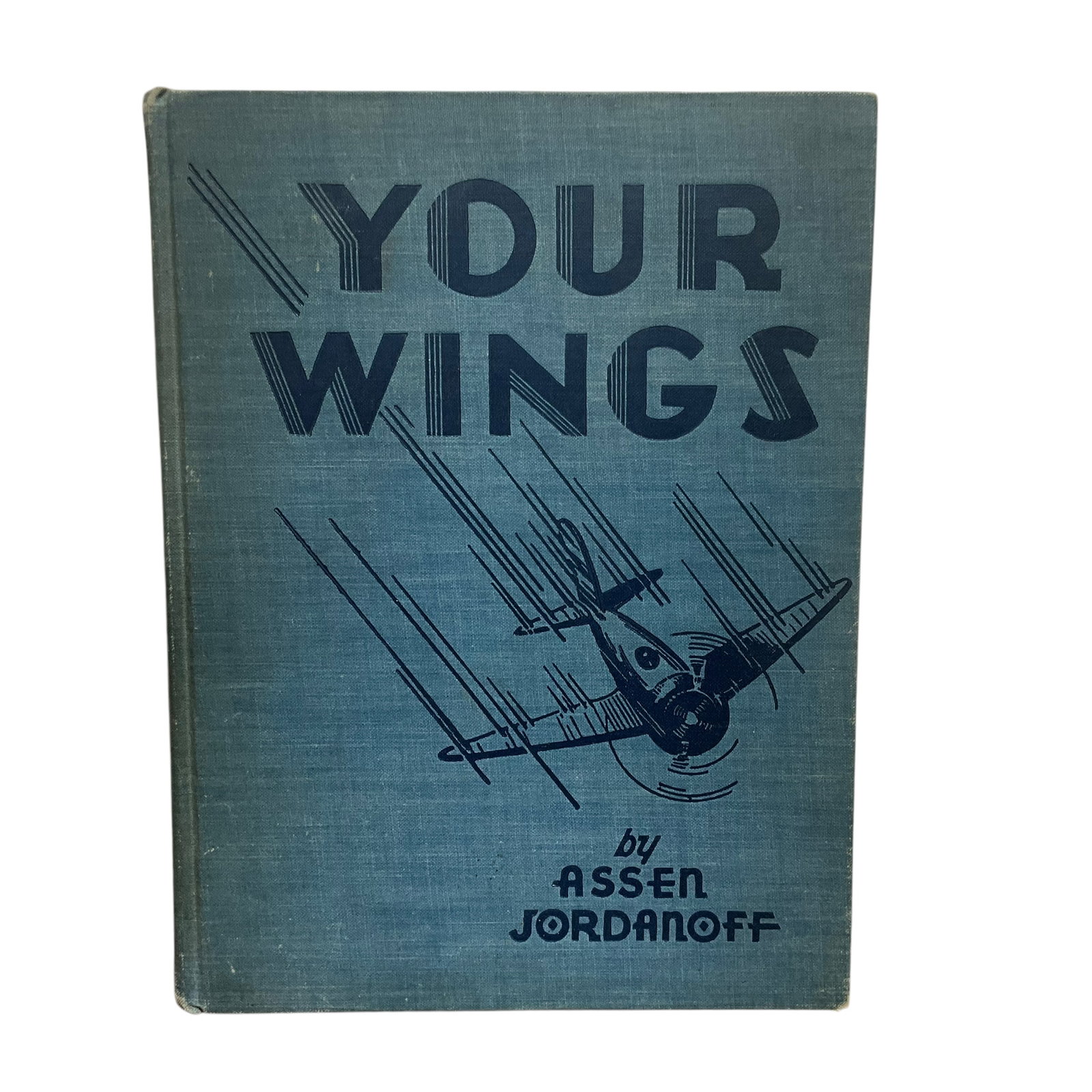 Your Wings by Assen Jordanoff; Copyright 1936. Signed by Author.: Good condition. Hard Cover. The book provides a complete corse in flying instruction, from ground training to navigating. Considered an artifact.