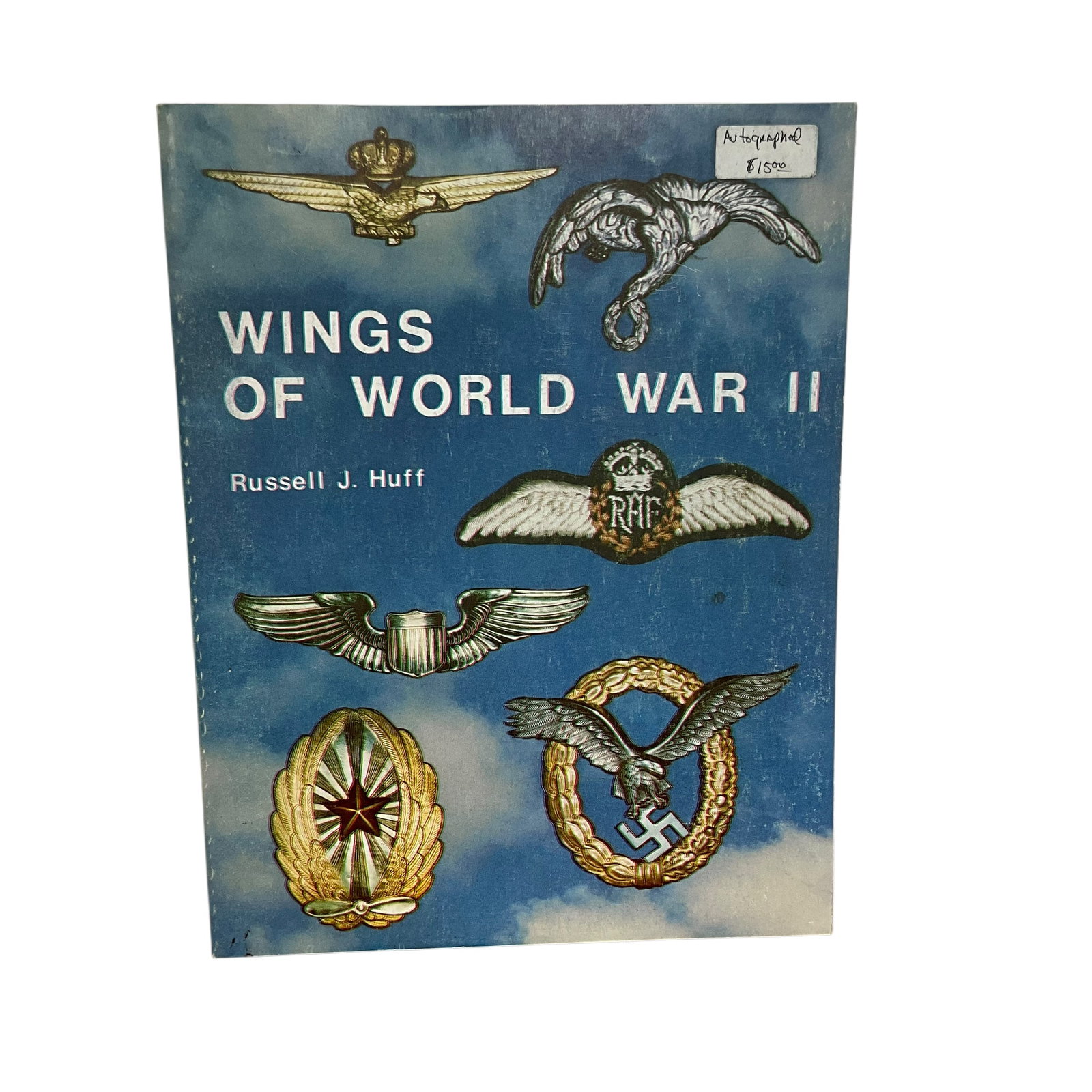 Wings of World War II by Russell J. Huff (Copyright 1981) Autographed by Author: Good condition. Soft cover with illustrations. A resource for learning about different pilot wings from WWII.