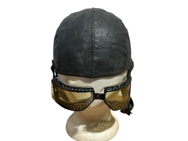 Well Worn Aviator Leather Cap And Goggles
