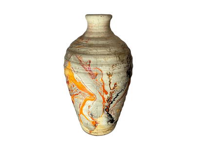 Nemadji Indian Pottery Vase: Mint condition. Multi Color. Stamped on bottom. Stands 8.25 inches tall.