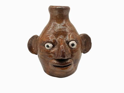 Early Ruby Meaders Small 1999 Face Jug: Mint condition. Signed and dated on body. Stands 4.5 inches tall and approximately 4.5 inches wide from ear to ear.