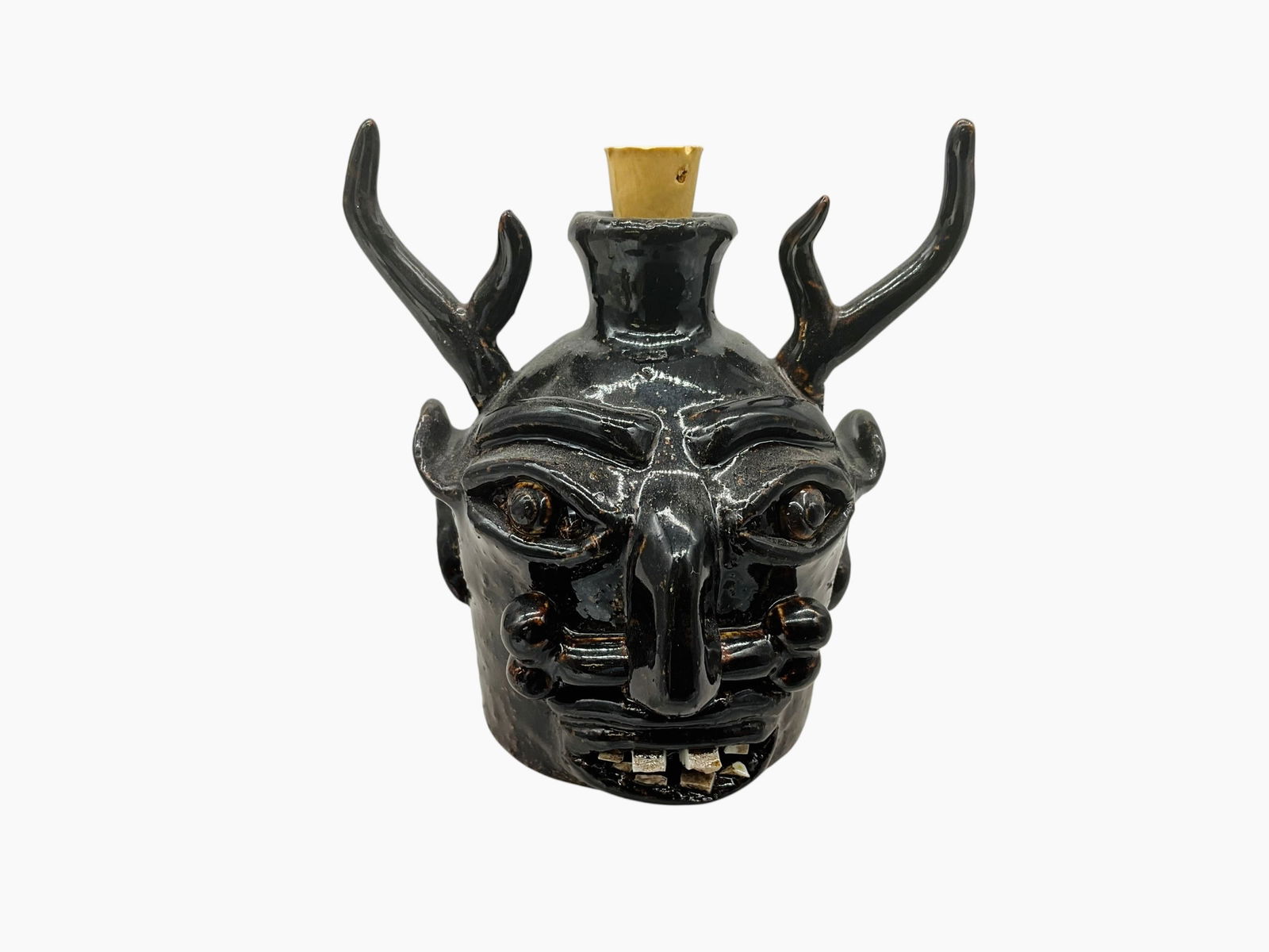 Michael Gates Mini Antler Face Jug: Mint condition. Great face jug with antlers and bone through nose. Stamped on back. Stands 3.5 inches and 3.5 inches wide from antler to antler.