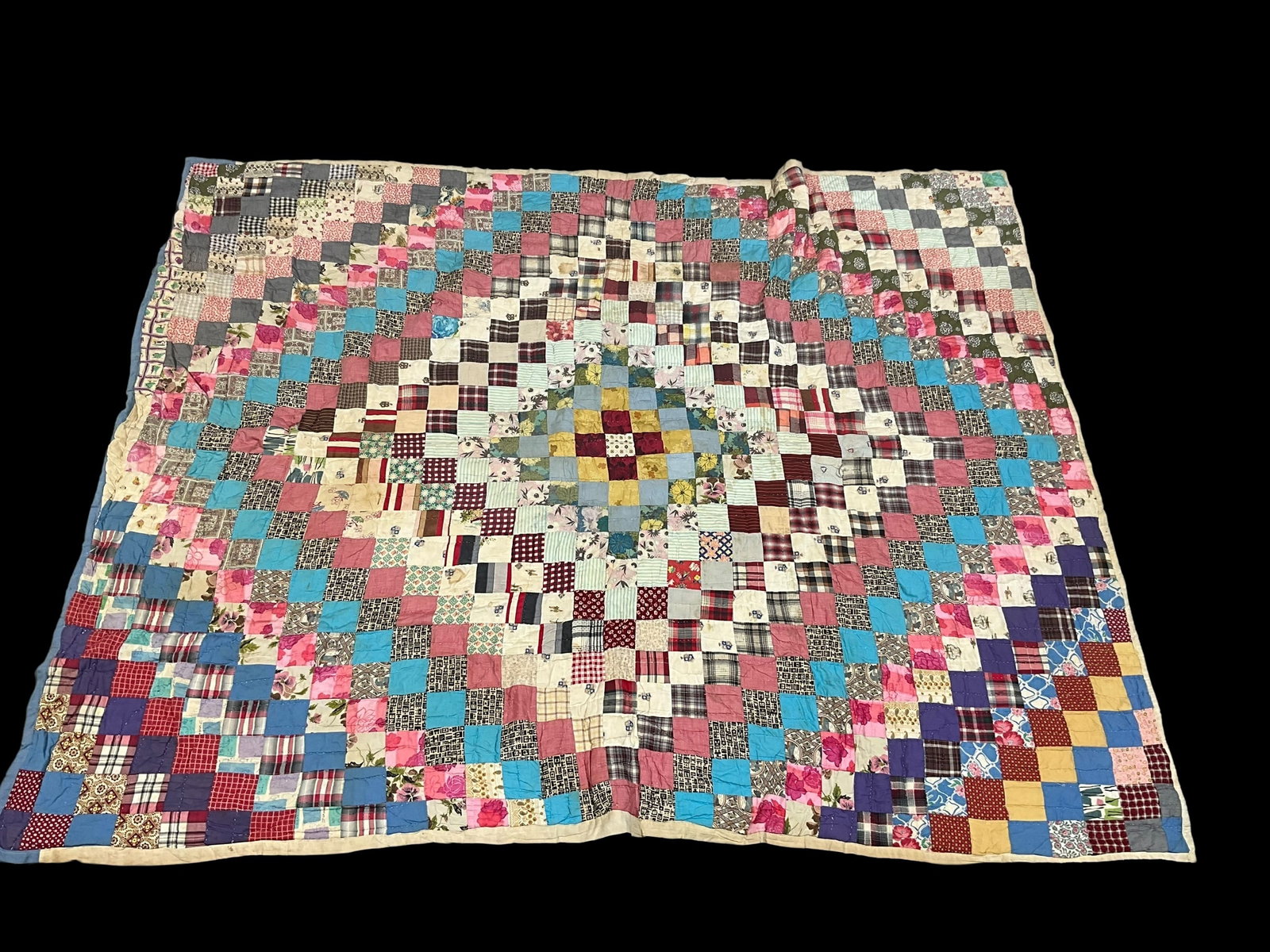 Hand Stitched Vintage Quilt: Measures 87 x 69 inches. A couple of unstitched areas. Needs cleaning. See photos for details.