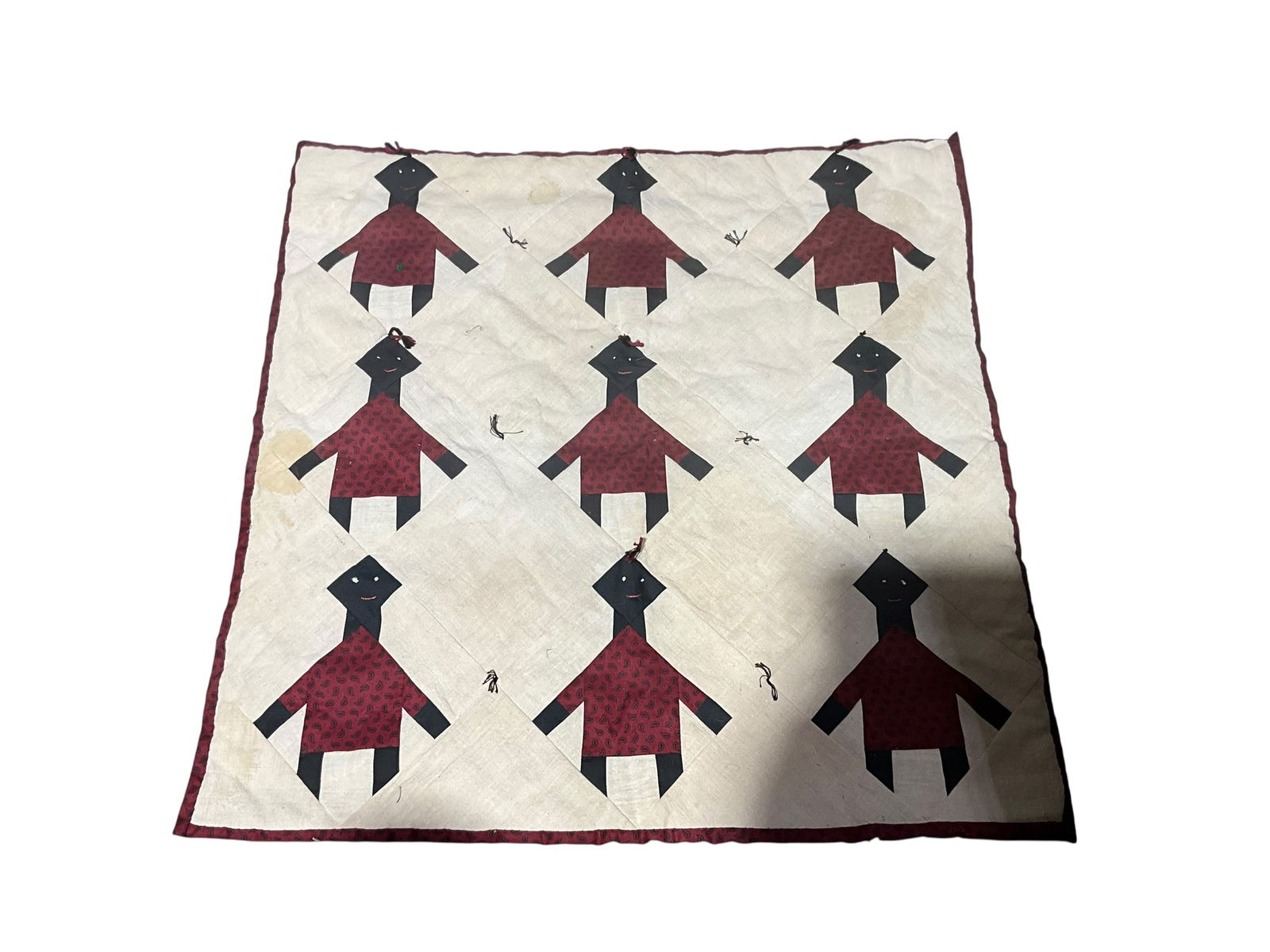 Babies On Punt Fabric Wall Hanging: Good condition. Measures 26 x 26 inches. Slot on top for hanging. Couple of minor stains. See photos.