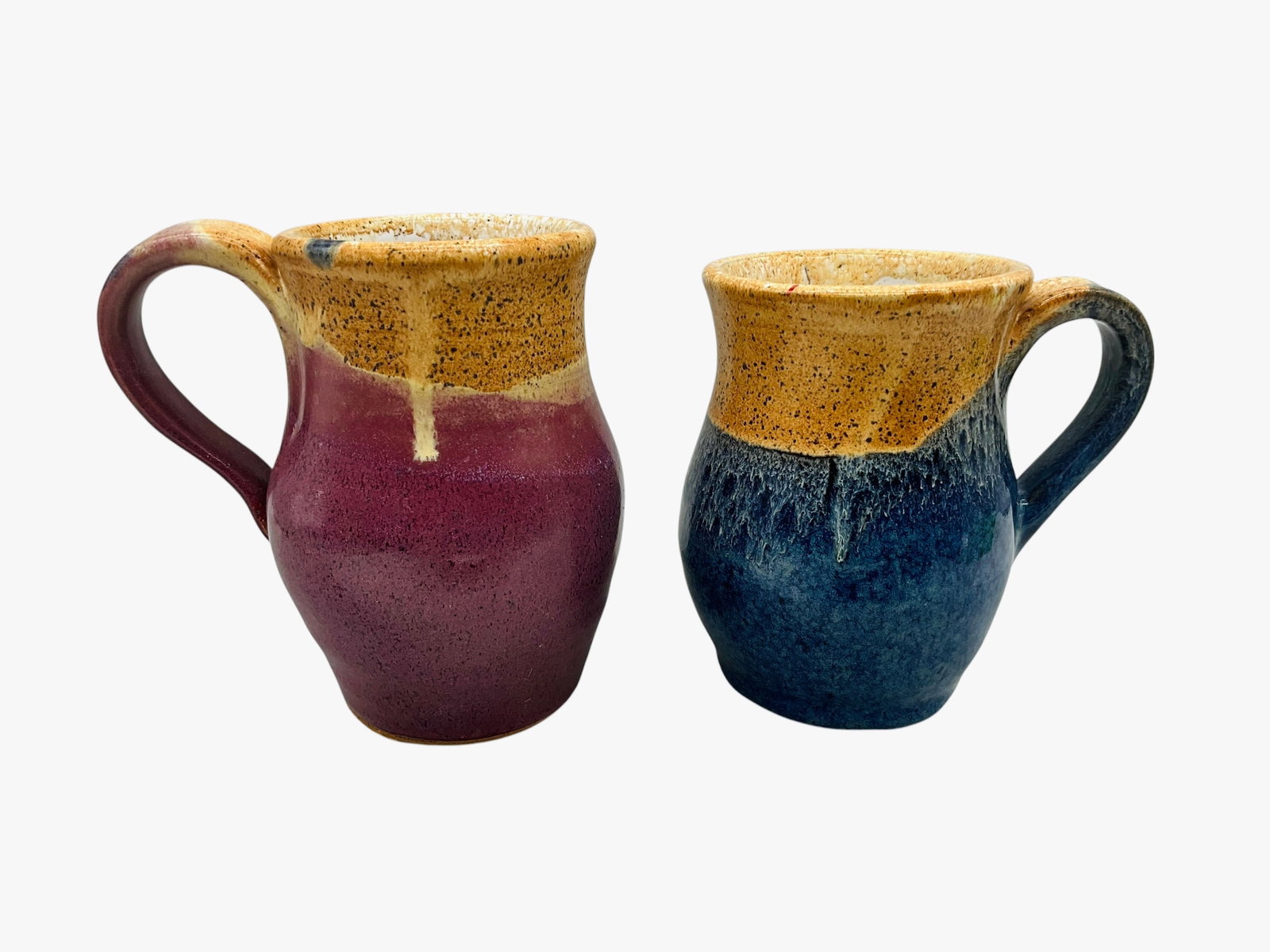 Two Rex Hogan Mugs: Both in mint condition. Signed on bottom. Each measures approximately L 4.75" x W 3.5" x H 4.75"