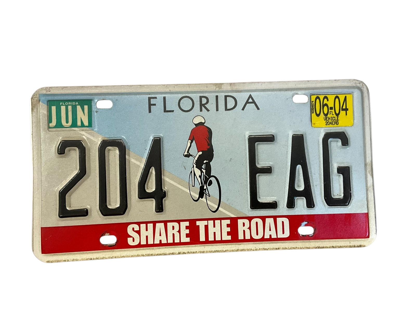 Florida 2004 SHARE THE ROAD Auto License Plate Tag: Used condition. See photos.