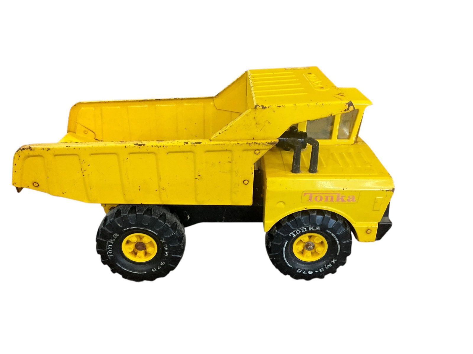 Vintage TONKA Metal Dump Truck: Vintage condition. 17 inches long as pictured. May have damage or signs of wear. Needs cleaning. See photos.