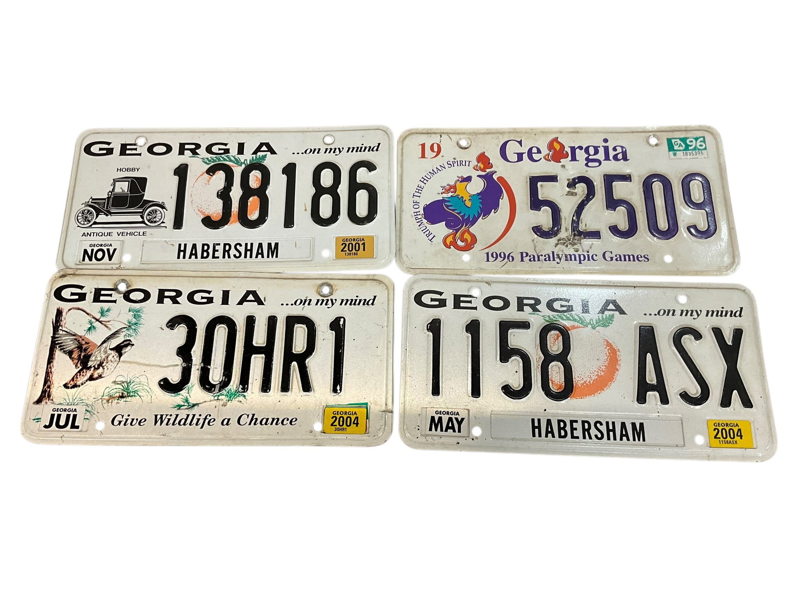 Lot Of 4 Georgia Auto License Plate Tags: Used condition. See photos.