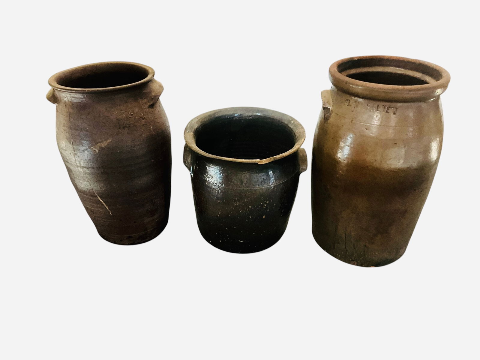 Three Survivor Churns - Salter and 2 Unknown: Damged but still in tact. Three gallon JW Salter churn with broken handle and chips throughout. Unknown 3 gallon churn with cracks down both side but still in tact. 2 gallon squatted churn with breaks