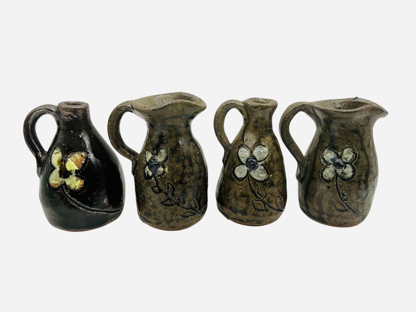 Four Mini Works - Grace Nell Hewell: Four small pieces total. All in mint condition and signed. Two floral pitchers and two floral jugs. Each piece stands between 3.5 and 3.75 inches.